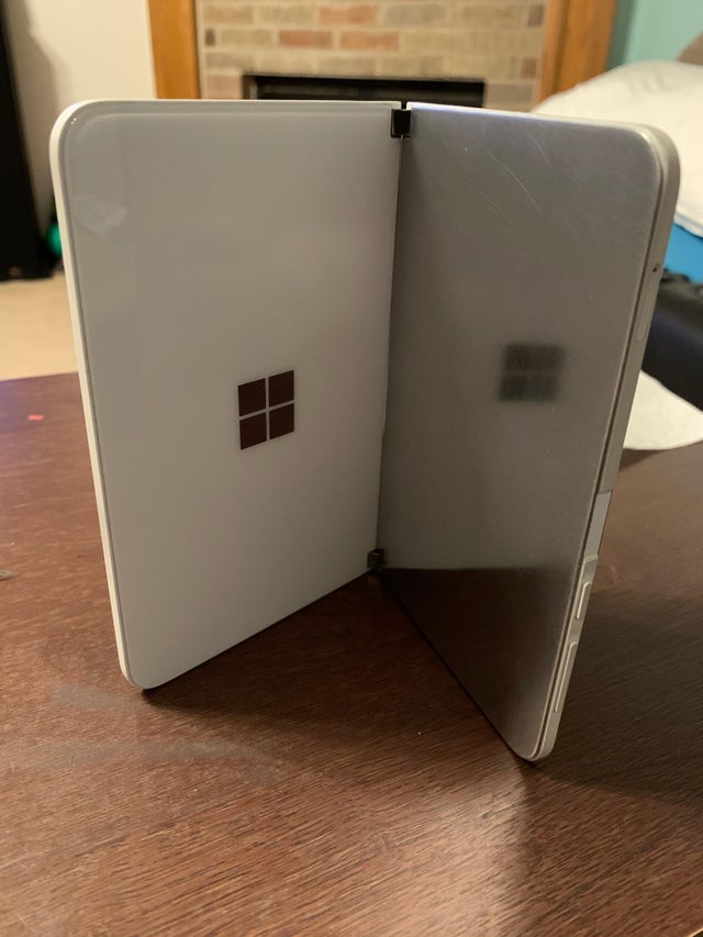 A Microsoft Surface Duo owner successfully replaces one of the broken Glass Panels with Metal